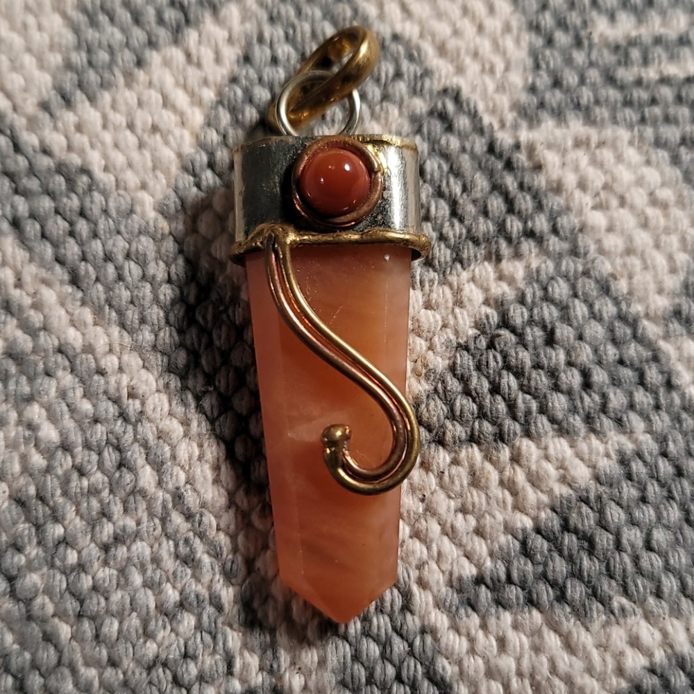 Carnelian (?) pendant